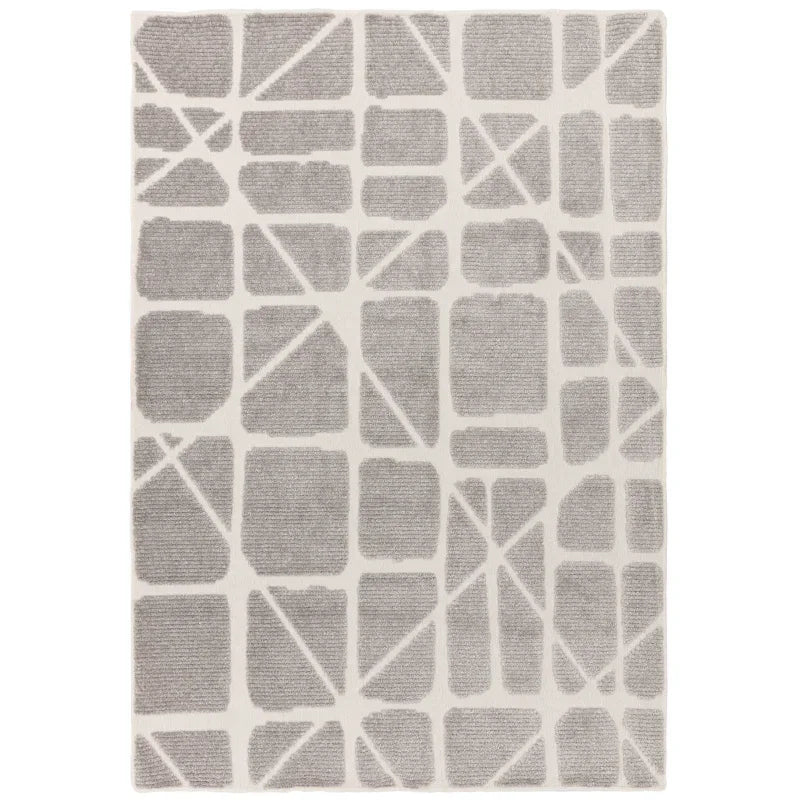Modern grey geometric area rug with white background and abstract square pattern