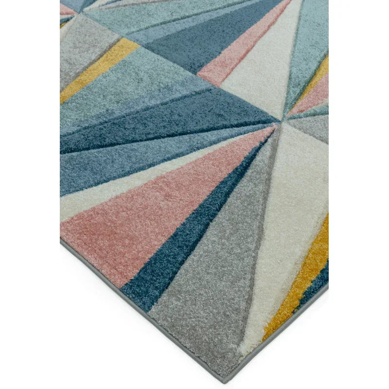 Geometric area rug with multicolored pastel triangles and textured pile