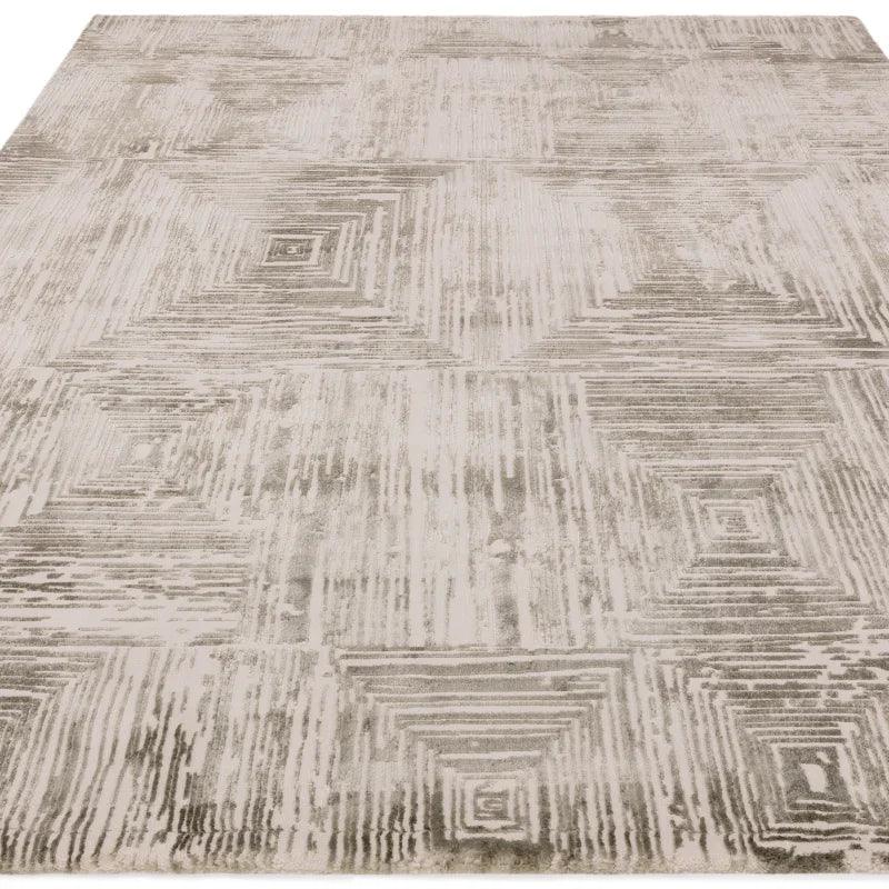 Neutral geometric area rug with textured square pattern in beige and grey tones