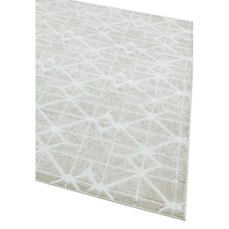 Cream geometric rug with white lattice pattern, close-up of corner and textured surface