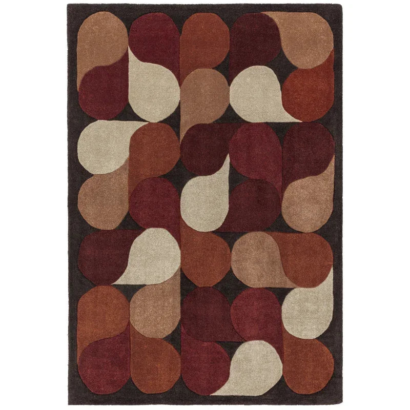 Modern wool rug with geometric teardrop shapes in beige, brown, rust, and burgundy tones