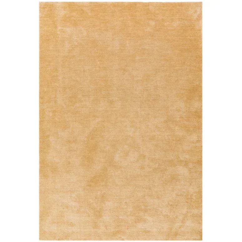 Beige area rug with soft texture and plain finish