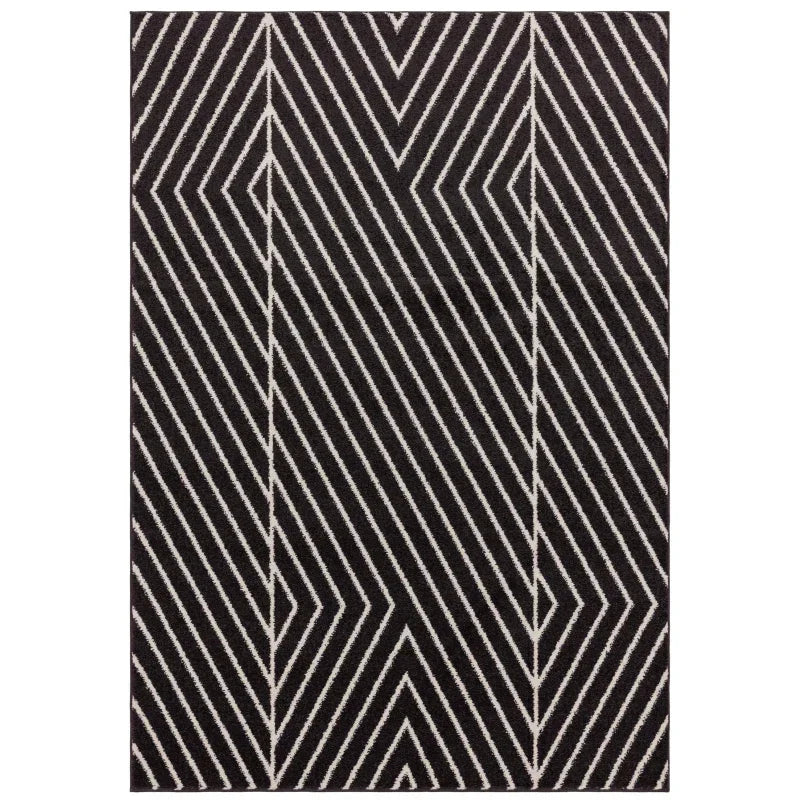 Black area rug with white geometric striped pattern, top-down view