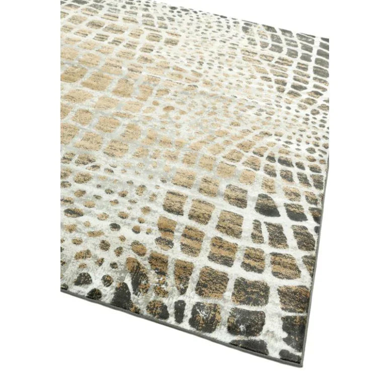 Beige and grey abstract patterned rug with textured pile, close-up corner view