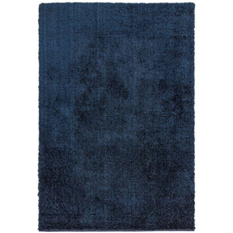 Navy blue shaggy area rug with soft pile and rectangular shape