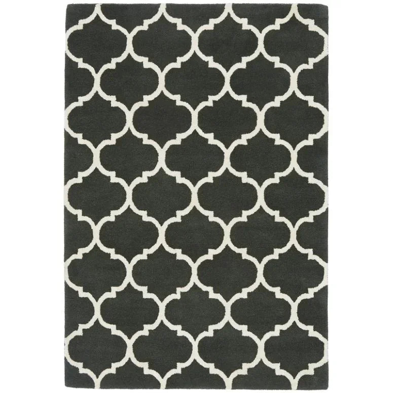 Black and white patterned area rug with geometric lattice design