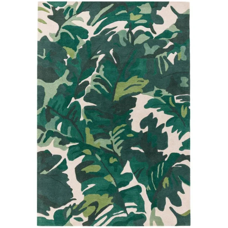 green botanical print area rug with large tropical leaf pattern