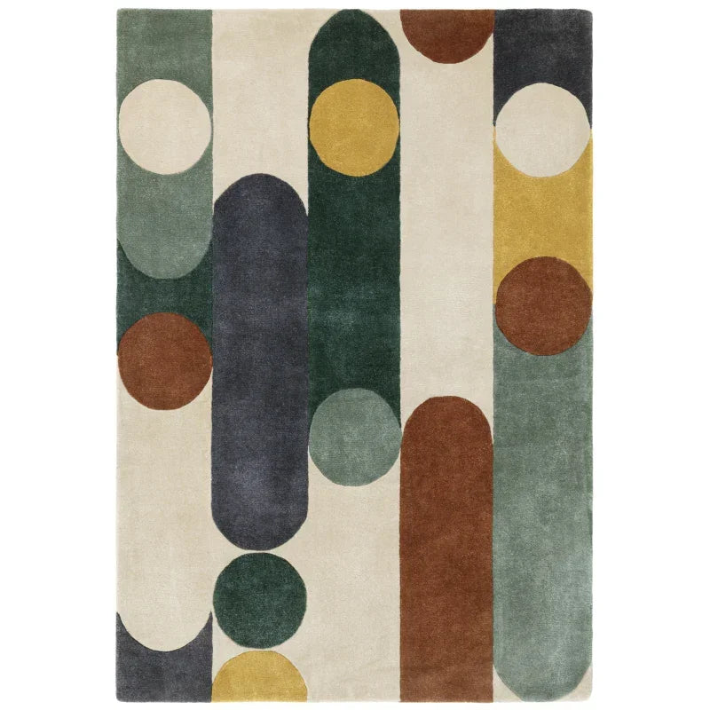 Geometric patterned area rug with green, mustard, brown, and cream shapes