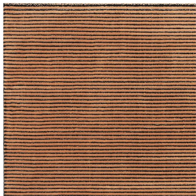 Brown striped area rug with black horizontal lines and textured surface