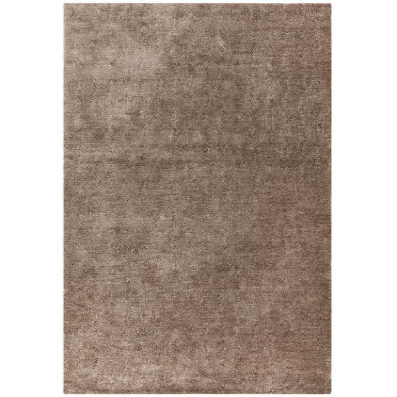 Large rectangular beige area rug with soft texture and plush pile