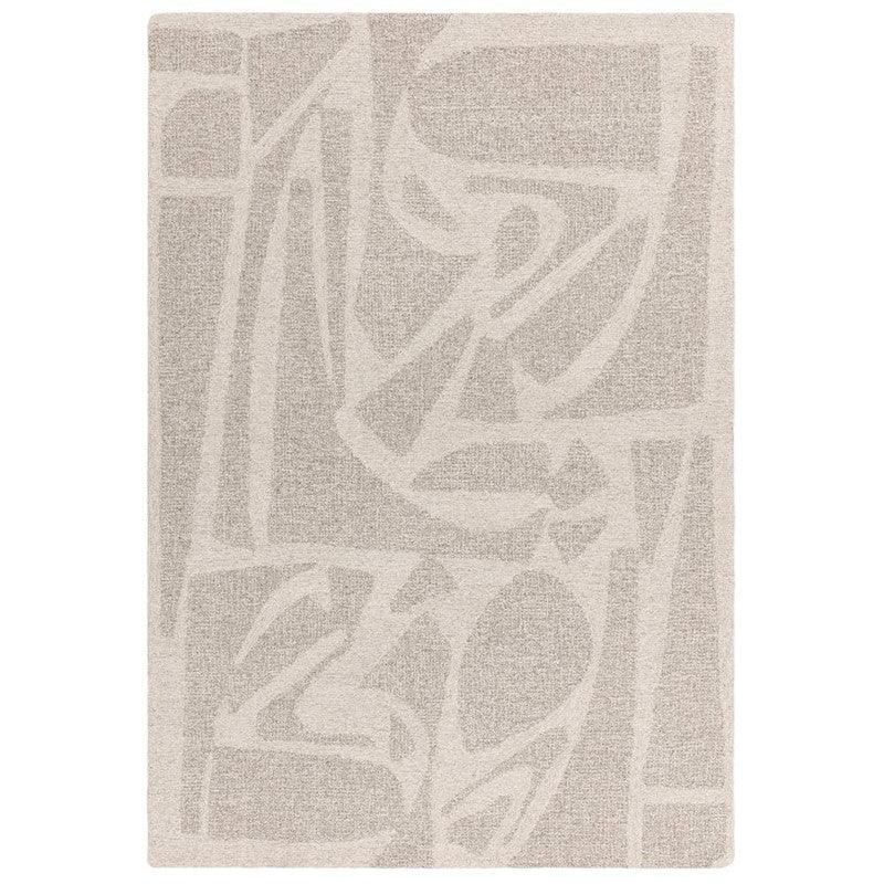 Beige abstract pattern area rug with raised textured detailing