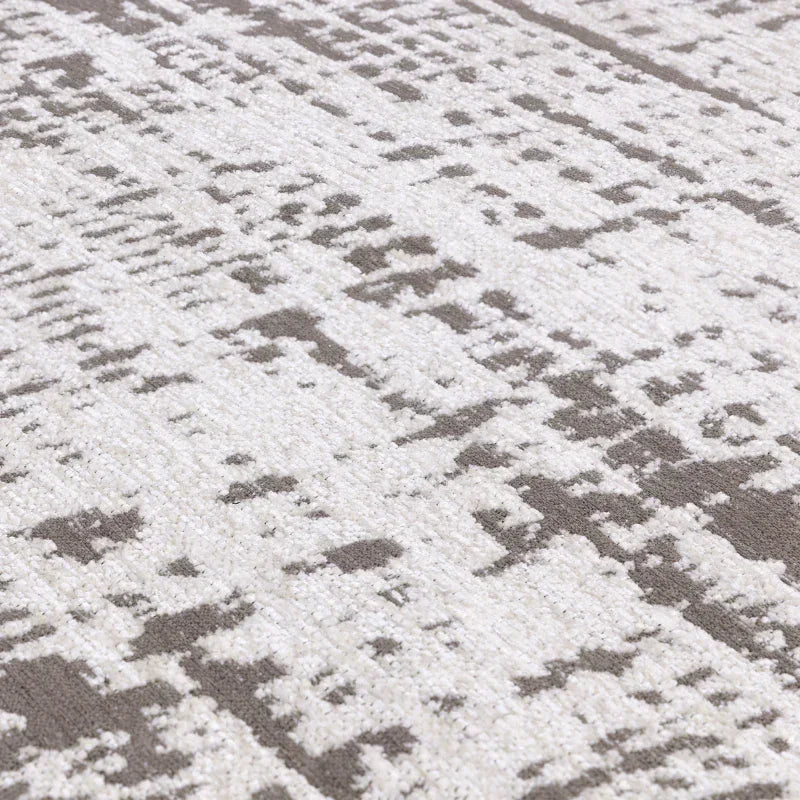 Grey and white abstract pattern rug close-up texture