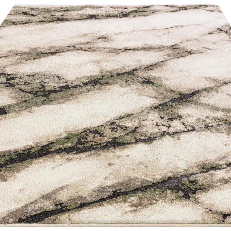 Marble effect area rug with cream, beige, and grey abstract pattern