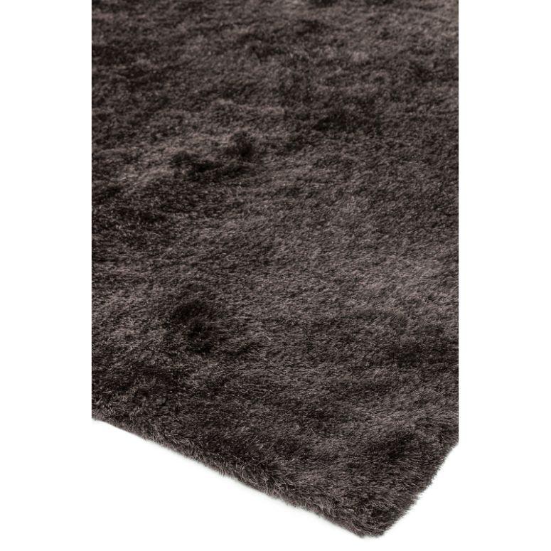 Charcoal shaggy rug with soft, thick pile and subtle texture, corner view