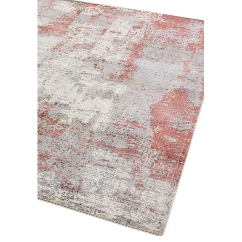 Modern area rug with distressed red and grey abstract pattern on soft fabric