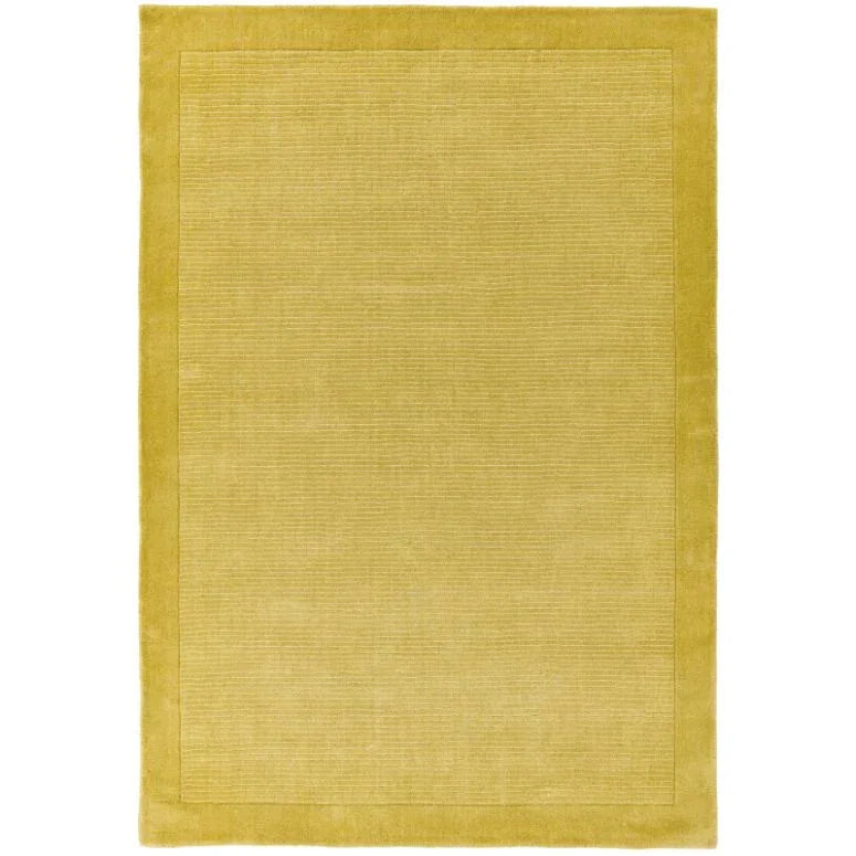 Yellow area rug with subtle tonal border and textured centre panel