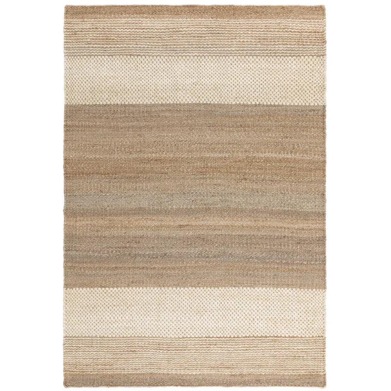 Neutral jute rug with beige and cream stripes and textured woven pattern