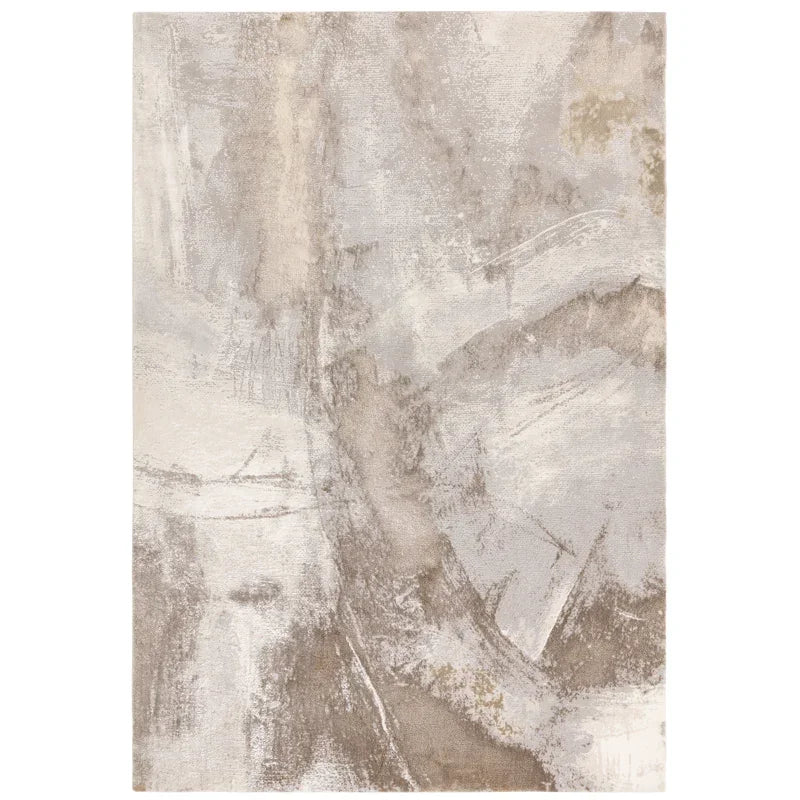 Abstract beige and grey area rug with textured pattern and soft finish