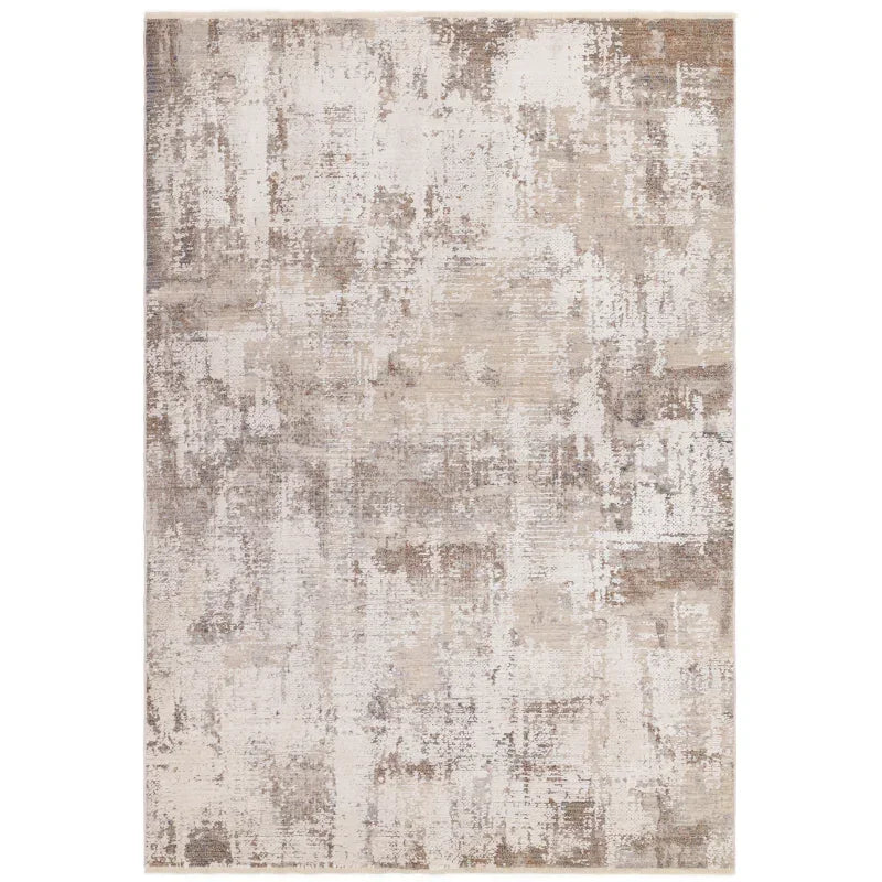beige and taupe abstract area rug with textured distressed pattern