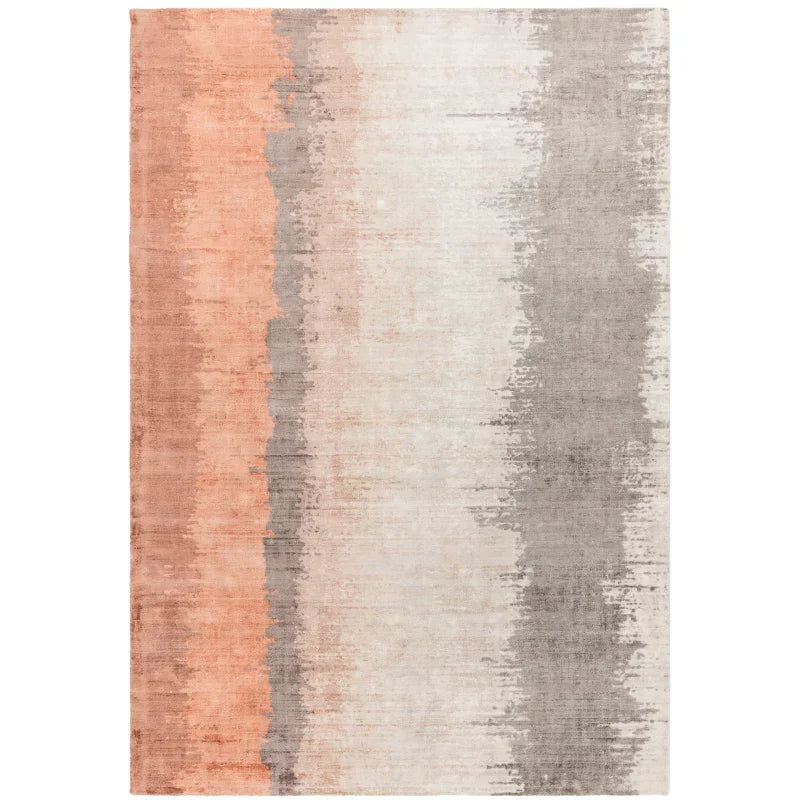 Modern area rug with vertical ombre stripes in peach, cream, and grey tones