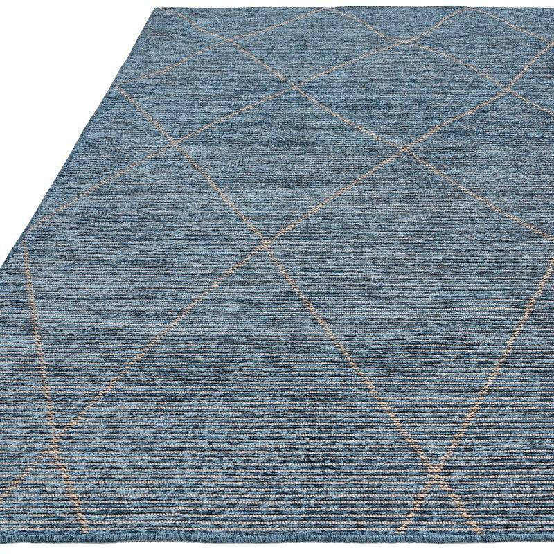 Blue area rug with beige diamond pattern and textured woven design, corner view