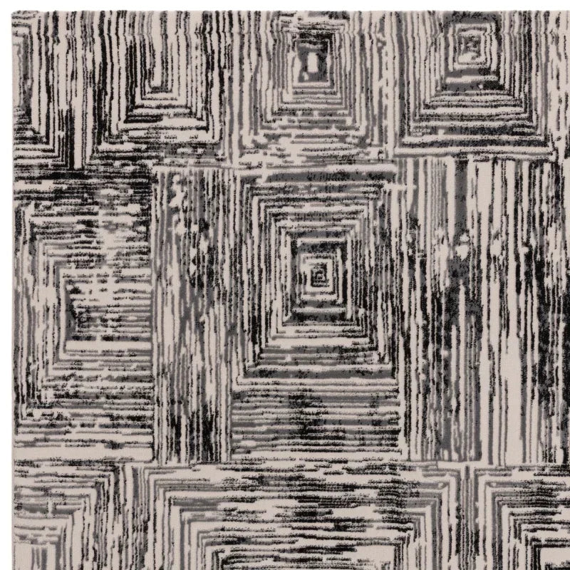 Modern geometric area rug in grey and cream with square pattern detail