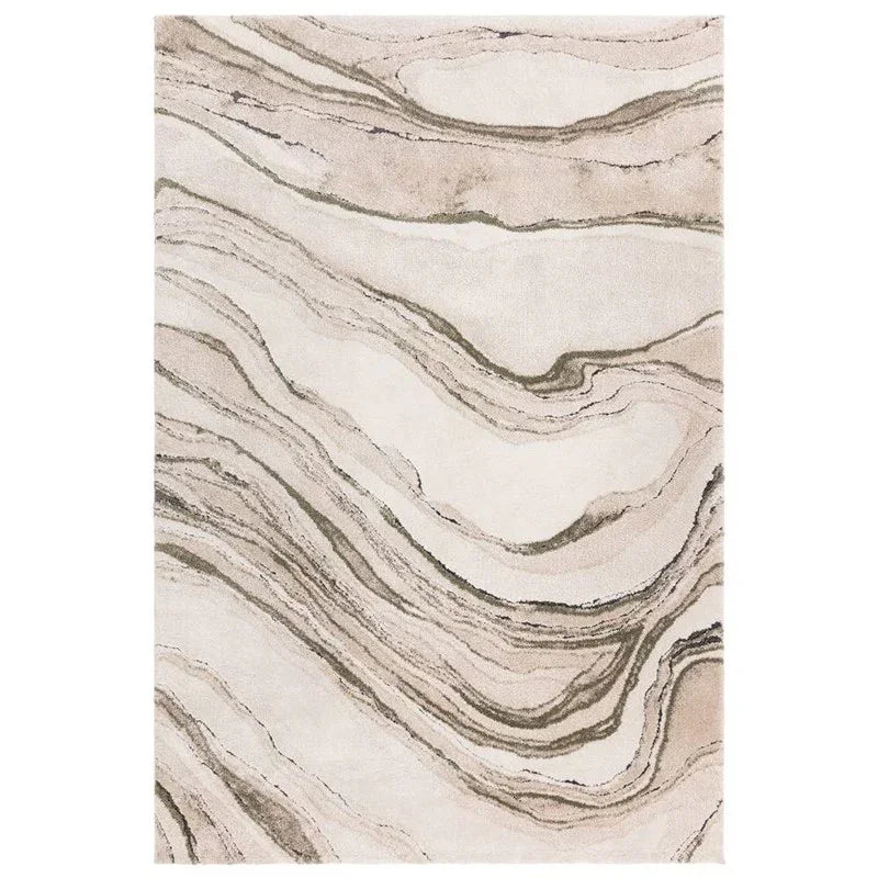 Beige and cream area rug with abstract marble pattern and soft texture