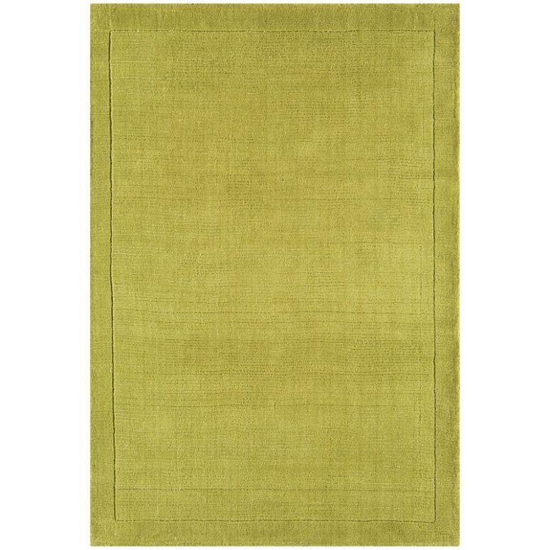 Green rectangular rug with subtle border pattern and soft texture