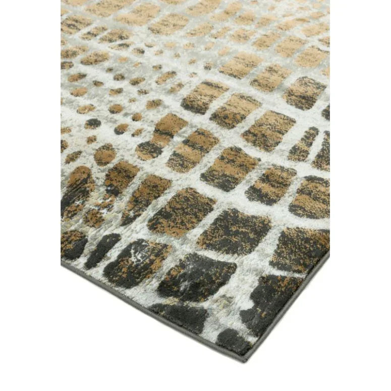 Modern area rug with geometric pattern in beige, brown, and black on white background