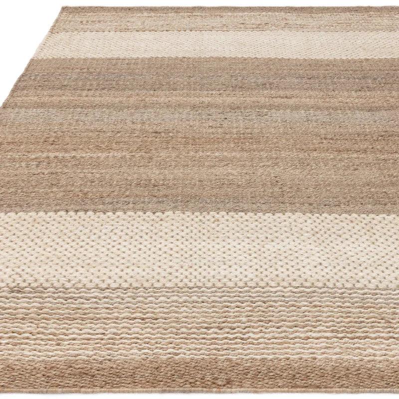 Beige and cream striped wool rug with textured weave pattern, viewed from front angle