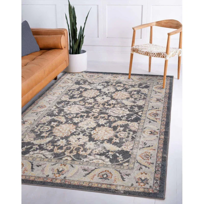 Traditional patterned area rug with floral design in living room setting