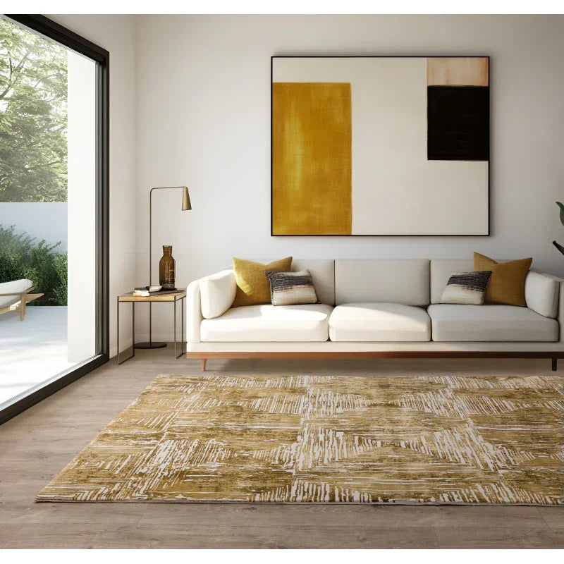 Modern living room with cream sofa, yellow abstract rug, and large wall art