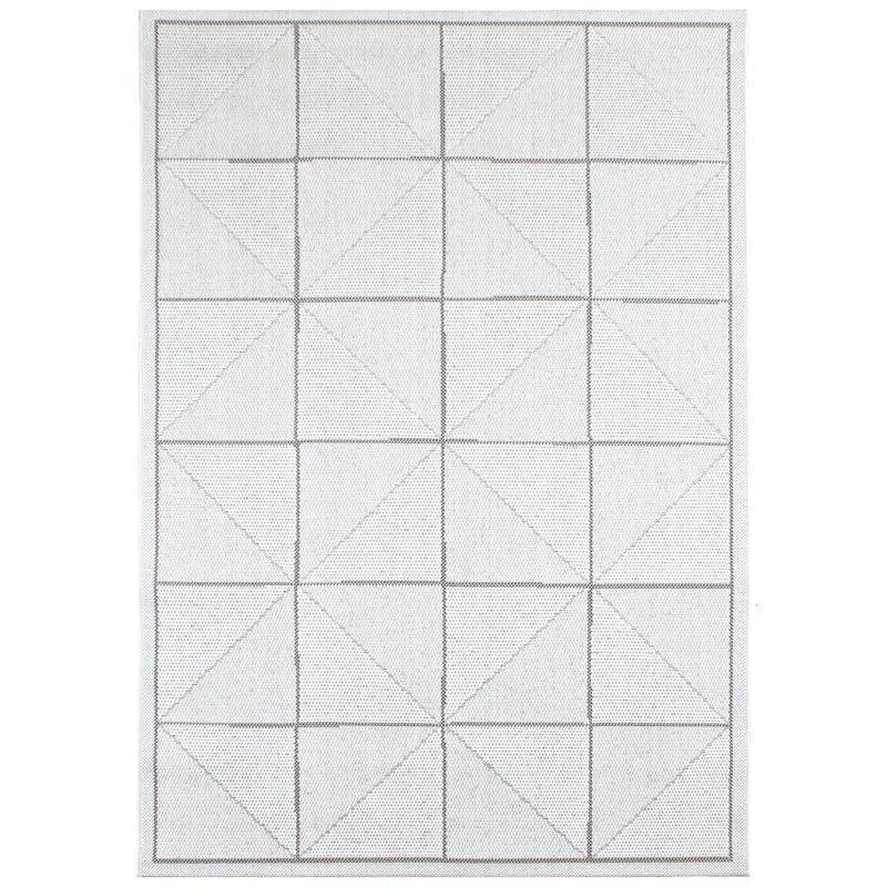 Geometric grey and white area rug with grid and diamond pattern, shown from overhead view