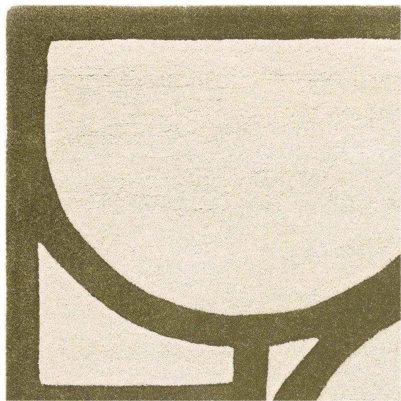 Cream and olive green geometric rug with modern abstract border detail