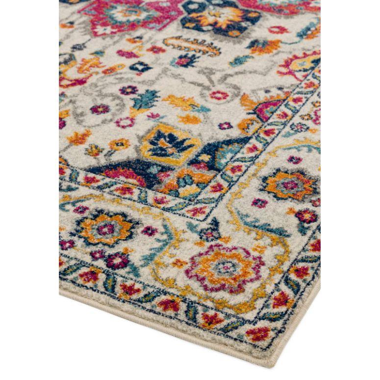 Multicolour area rug with floral and geometric patterns on a cream background, corner view