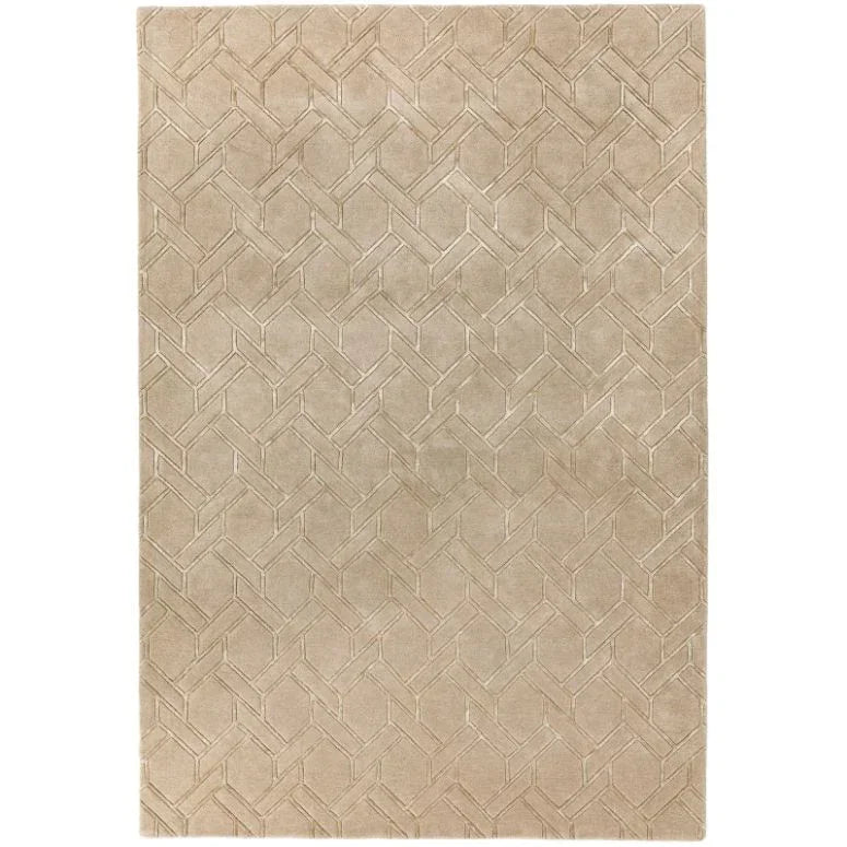 Beige area rug with geometric embossed pattern and soft textured surface