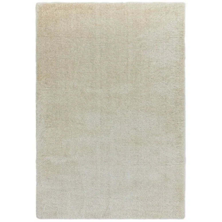cream shaggy area rug with plush pile and rectangular shape