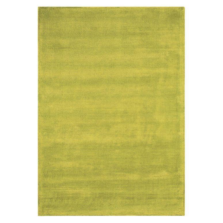 Lime green area rug with subtle texture, rectangular shape, modern living room accessory