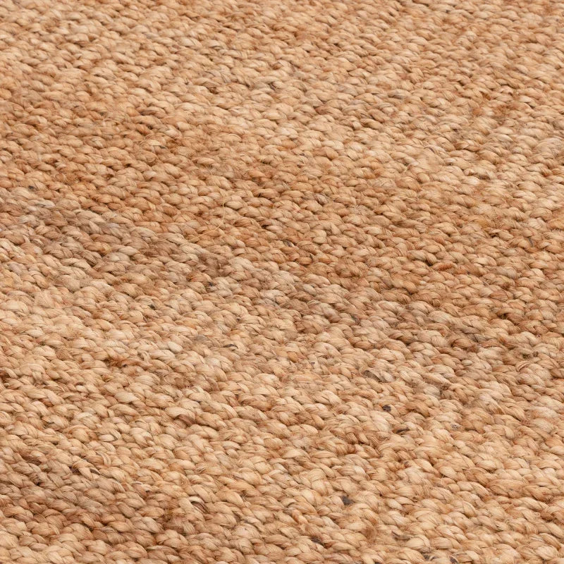 close-up of natural jute rug texture with chunky woven pattern