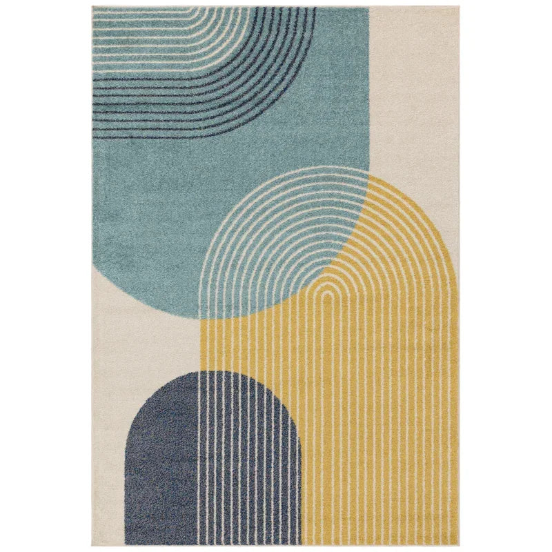 Modern abstract area rug with blue, yellow, and cream geometric arches