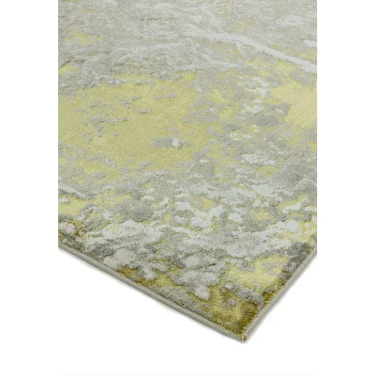 Abstract yellow and grey area rug with soft textured pattern and finished edge corner