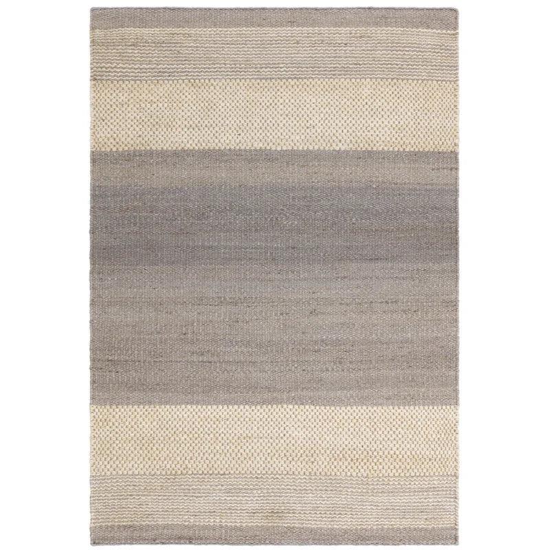 Grey and cream striped wool rug with textured woven pattern, rectangular shape