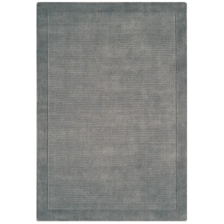 Grey rectangular area rug with textured border and subtle linear pattern