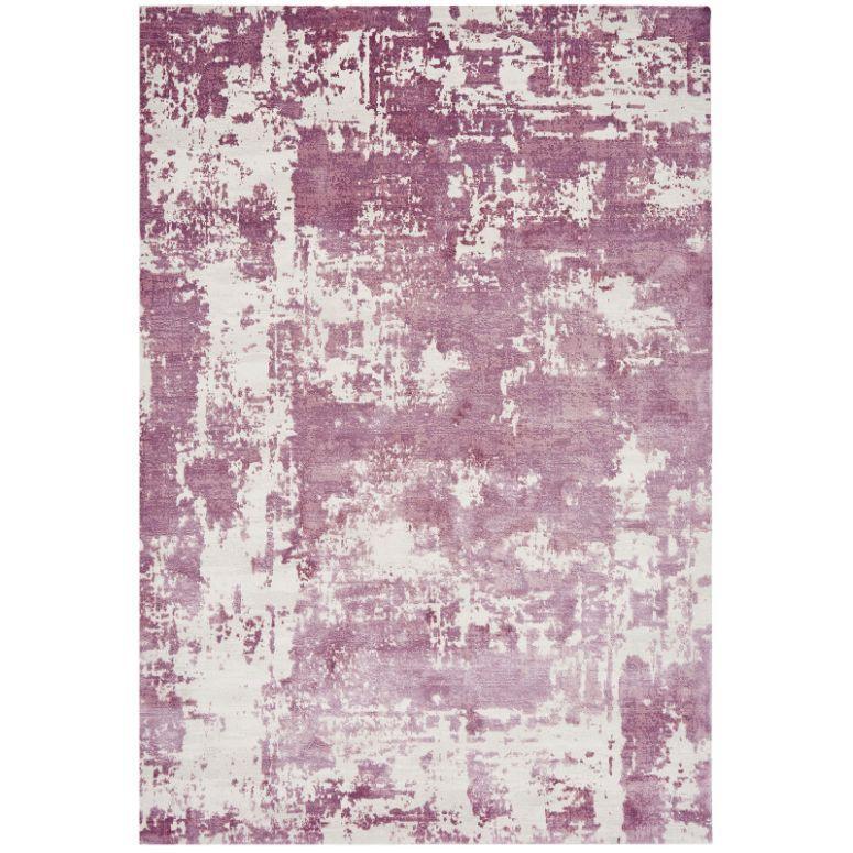 Modern area rug with abstract lilac and cream pattern, rectangular layout