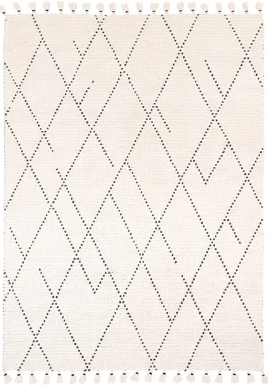 Cream area rug with black diamond lines and fringe edging