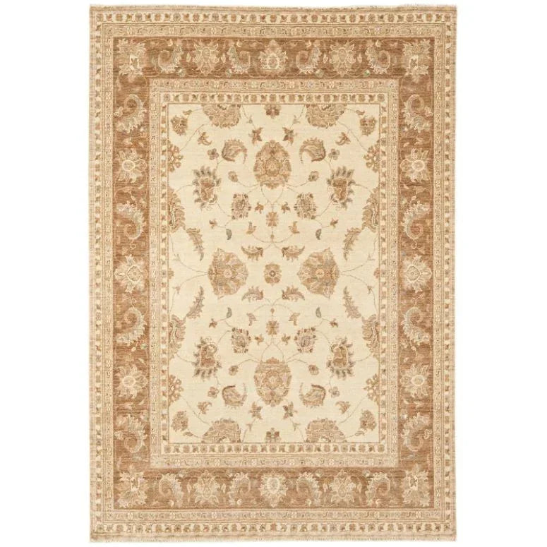 Beige and brown patterned area rug with ornate floral border and central medallion design