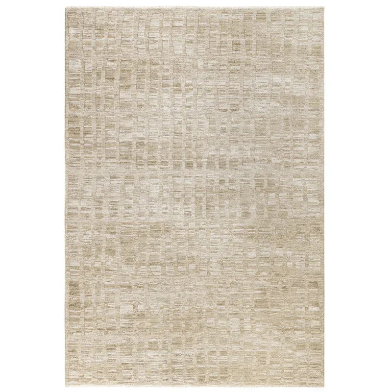 Beige textured area rug with subtle geometric pattern, rectangular shape, overhead view