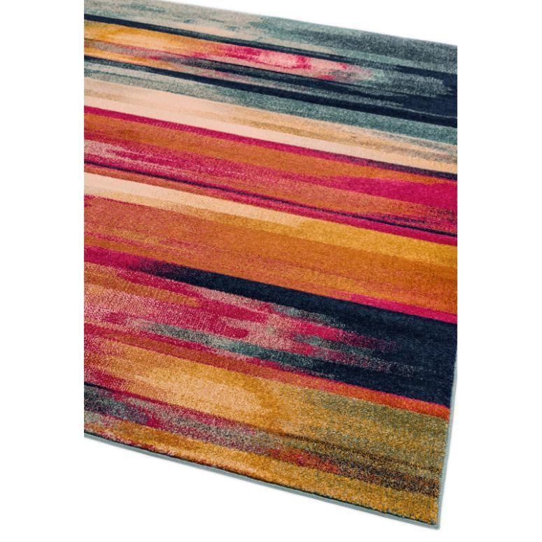 Multicolour abstract area rug with orange, pink, and blue streaks, angled corner view