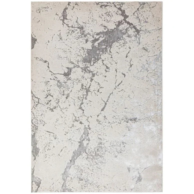 Beige and grey abstract area rug with a marble effect pattern