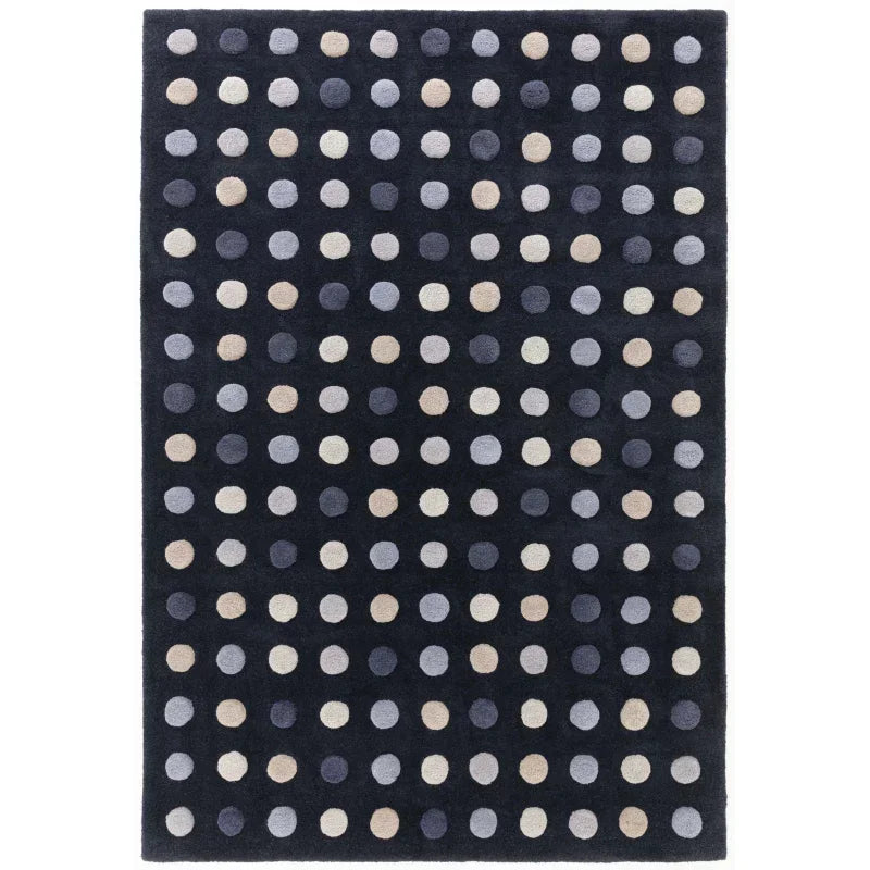 navy blue area rug with cream and grey polka dot pattern